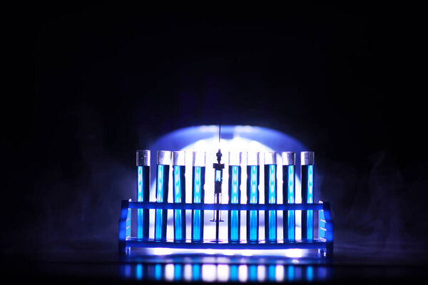 Test tube of glass overflows new liquid solution potassium blue conducts an analysis reaction takes various versions reagents using chemical pharmaceutics cancer manufacturing 