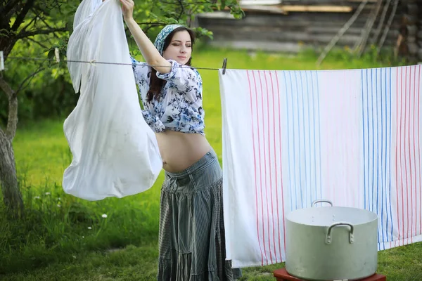 Pregnant Woman Hanging Wash Clothes Rope Drying — Stock Photo, Image