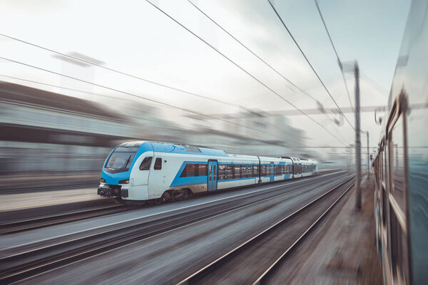 Modern electric train waiting on the staion of Ljubljana on a winter evening, waiting to start commuter service towards Kocevje, Slovenia.
