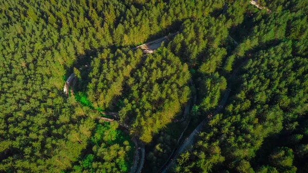 Aerial view of Abandoned or deserted remains of former bobsleigh track in Sarajevo, for the 1984 winter games.