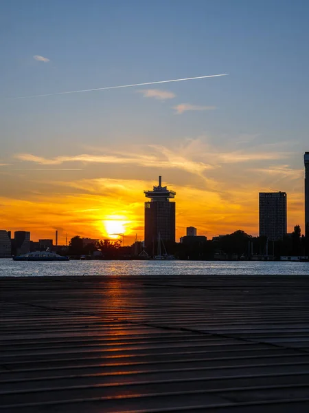 Sunset in Amsterdam with skyline and buildings