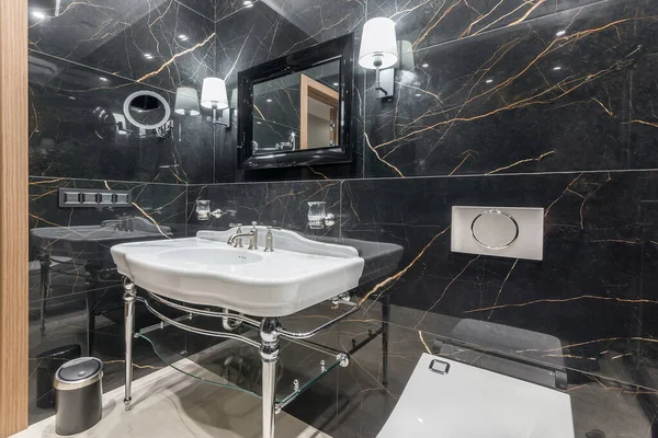 Stylish Bathroom Walls Decorated Black Marble Tiles Mirror Original Sink — стоковое фото