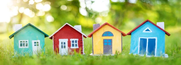 Several Colourful Houses Models Standing Green Grass Panoramic View Conceptual — Stockfoto