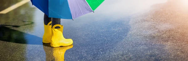 Child Standing Puddle Yellow Rubber Boots Concept Childhood — Photo