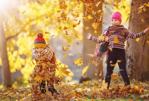 Children Throwing Colourful Leaves Autumnal Park Concept Friendship Freedom — 스톡 사진
