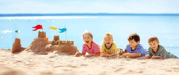Funny Children Lying Sand Seashore Building Sandcastle Concept Family Vacation — Stock fotografie