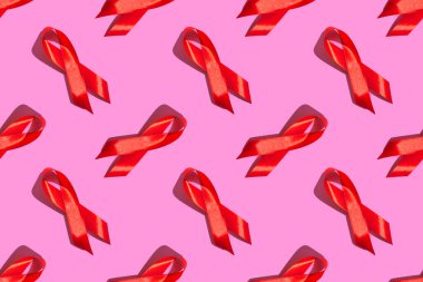 Dünya AIDS Günü. Pembe arka planda kusursuz desen. AIDS farkındalığı konsepti. 1 Aralık.