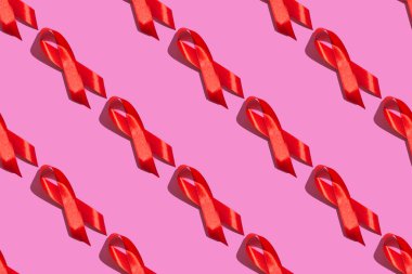 Dünya AIDS Günü. Pembe arka planda kusursuz desen. AIDS farkındalığı konsepti. 1 Aralık.