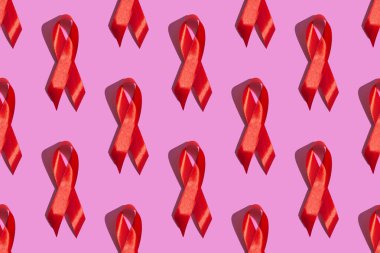 Dünya AIDS Günü. Pembe arka planda kusursuz desen. AIDS farkındalığı konsepti. 1 Aralık.