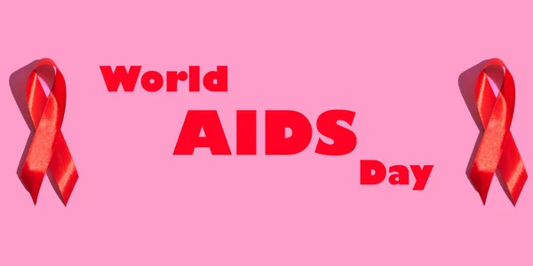 Διεθνής Ημέρα Aids Κόκκινη Κορδέλα Σκληρή Σκιά Ροζ Φόντο Αντίληψη — Φωτογραφία Αρχείου