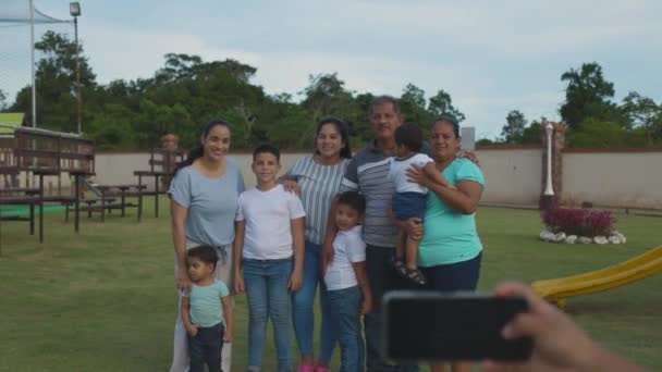 Latino Family Taking Photo Park Happy — Stock Video