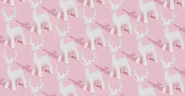 用粉红背景的白色驯鹿饰品制成的富有创意的粉红冬季图案 时尚圣诞作文 — 图库照片