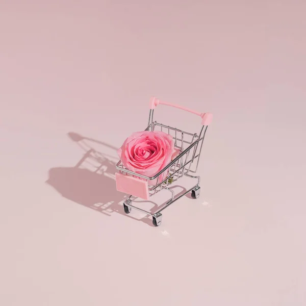 パステルピンクのバラとカートとの最小限のトレンディーなバレンタインデーのショッピングコンセプト 現代のロマンチックな美意識 — ストック写真