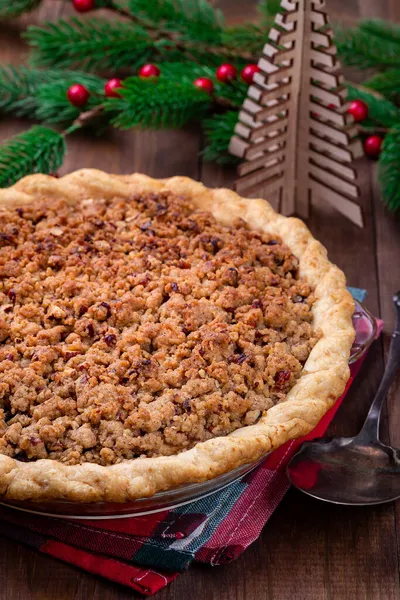 American apple cranberry pie, topped with crumbled dough and pecan, vertical — Stock Photo, Image
