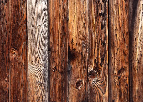 Old rustic reclaimed wood plank wall. Nature background or texture for design.
