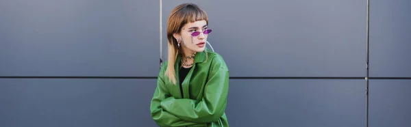Tattooed Woman Stylish Eyeglasses Green Leather Jacket Looking Away Grey — Stock Photo, Image