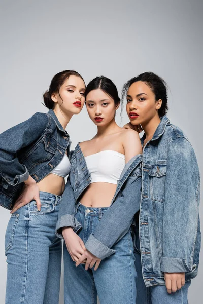 Low Angle View Young Interracial Women Denim Jackets Looking Camera — Stock Photo, Image