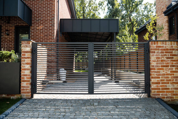 modern fence in outdoor garage space in house 