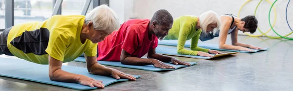 Multiethnic Senior People Training Fitness Mats Gym Banner — Stock Photo, Image
