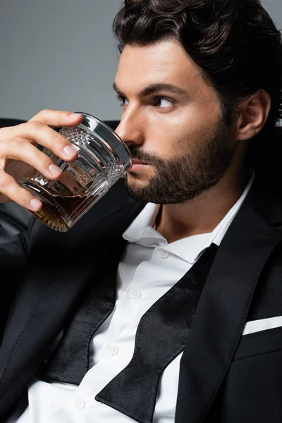 Bearded Man Wavy Hair Drinking Brandy Isolated Grey — Stock Photo, Image