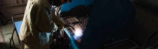 Welder Uniform Holding Torch Factory Banner — Stockfoto