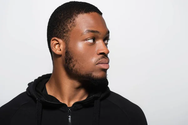 Young African American Man Hoodie Looking Away Isolated Grey — Stock Photo, Image
