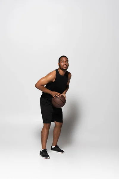 Full Length African American Player Holding Basketball While Aiming Grey — Fotografia de Stock