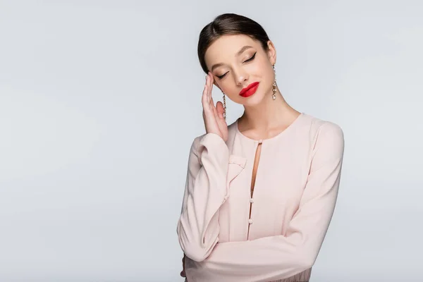Pleased Woman Earrings Blouse Posing Isolated Grey — Stockfoto