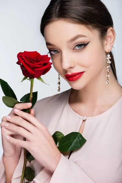 Pretty Young Woman Earrings Blouse Holding Red Rose Isolated Grey — стоковое фото