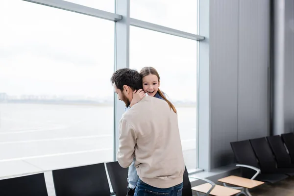 Cheerful Kid Hugging Bearded Father Airport — Stock fotografie