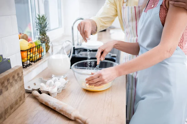 Cropped View Man Pouring Flour Bowl While Wife Mixing Eggs — Stock Photo, Image