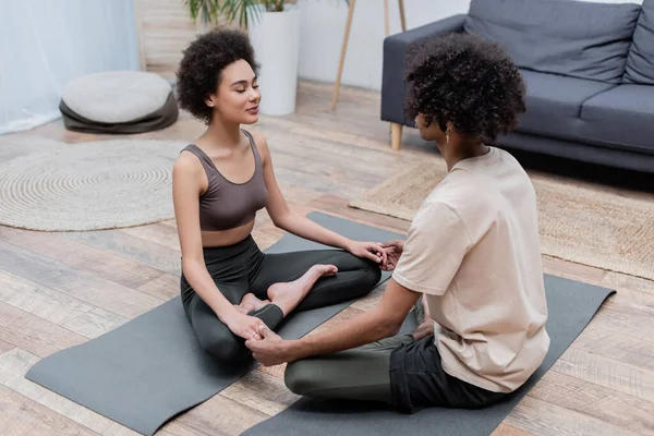 African American Woman Holding Hands Boyfriend While Meditating Home — Stock Photo, Image