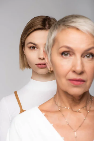 Young Woman Standing Blurred Middle Aged Mother Isolated Grey — Stock Photo, Image