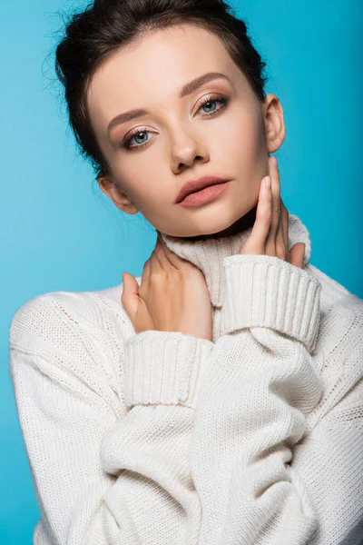 Woman White Warm Sweater Touching Face Isolated Blue — Stock Photo, Image