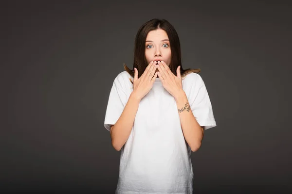 Shocked Woman Covering Mouth Hands While Looking Camera Isolated Dark — Stock Photo, Image