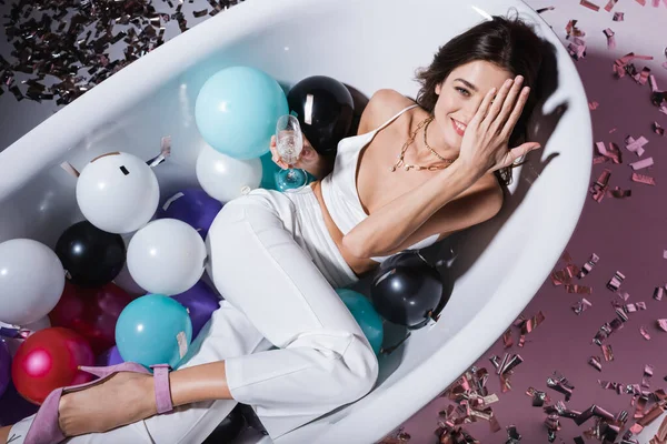 Top View Happy Woman Covering Eye Lying Bathtub Balloons While — Stock Photo, Image