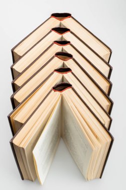 high angle view of open books on grey background clipart