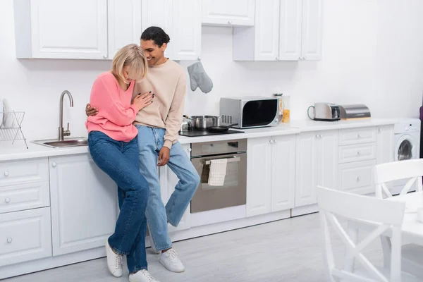 Full Length Pleased Multiethnic Couple Standing Modern Kitchen — Stock Fotó