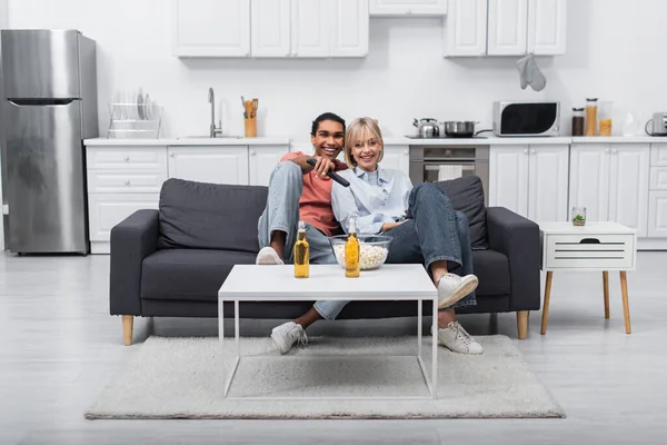 Happy Interracial Couple Watching Movie Together — Stock Photo, Image