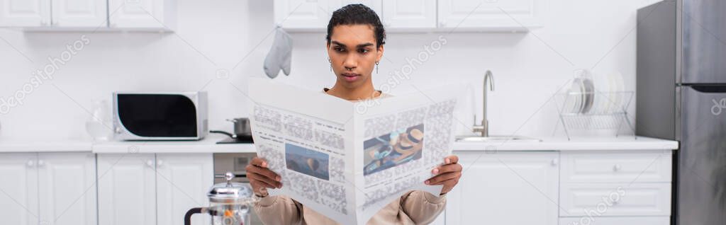 african american man reading newspaper near french press, banner