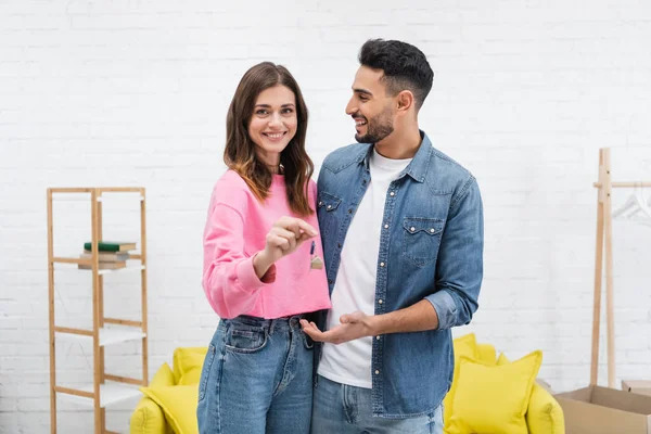 Cheerful Woman Holding Key Arabian Boyfriend Home — Stock Photo, Image