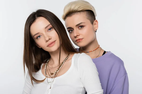Pretty Trendy Lesbian Couple Makeup Looking Camera Isolated Grey — стоковое фото