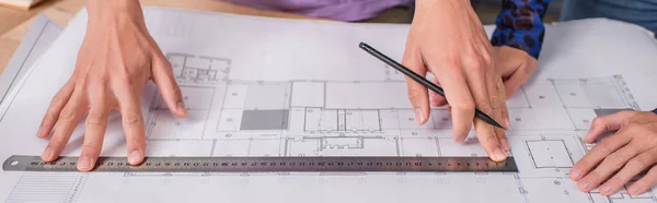Cropped view of interior designers working with blueprint, banner — Stock Photo