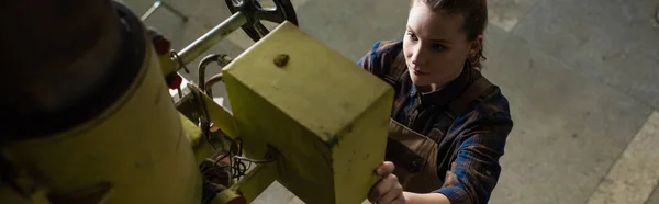 High angle view of welder working with welding machine in factory, banner — Stockfoto