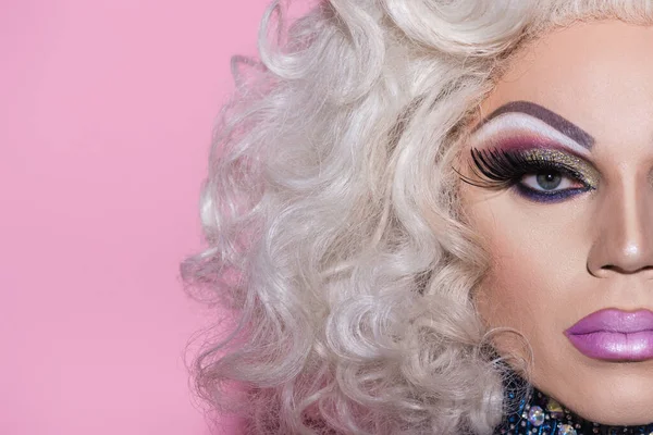 Cropped view of man in bright makeup and wig isolated on pink — Stock Photo