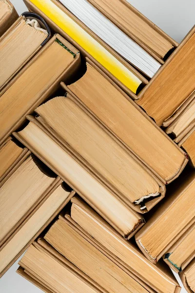 Top view of paper books collection isolated on grey — Stock Photo