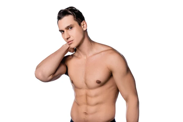 Brunette shirtless man posing with hand behind neck and looking at camera isolated on white — Stock Photo