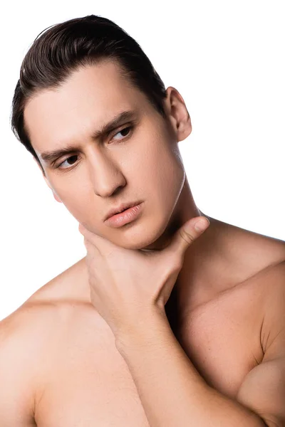 Man with naked chest touching neck and looking away isolated on white — Stock Photo