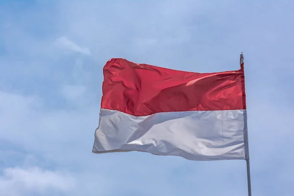 Indonesian Red White National Flag Rising Clear Bright Blue Sky — Stock Photo, Image
