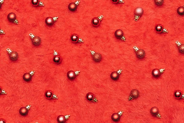 Patrón Bombilla Navidad Elegante Sobre Fondo Textura Esponjosa Roja Única — Foto de Stock